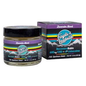 A container of Floyds of Leadville Recovery Balm Lavender Blend with 600mg of Full-Spectrum Select CBD with Lidocaine and a box of Floyds of Leadville Recovery Balm Lavender Blend with 600mg of Full-Spectrum Select CBD with Lidocaine