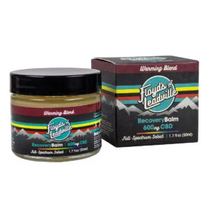 A container of Floyds of Leadville Recovery Balm Warming Blend with 600mg of Full-Spectrum Select CBD and a box of Floyds of Leadville Recovery Balm Warming Blend with 600mg of Full-Spectrum Select CBD
