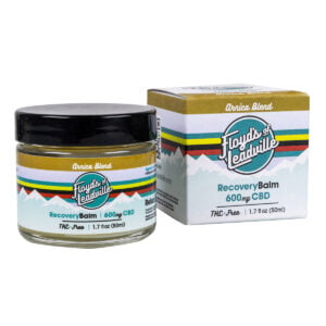 A container of Floyds of Leadville Recovery Balm Arnica Blend with 600mg of THC-Free Isolate CBD and a box of Floyds of Leadville Recovery Balm Arnica Blend with 600mg of THC-Free Isolate CBD